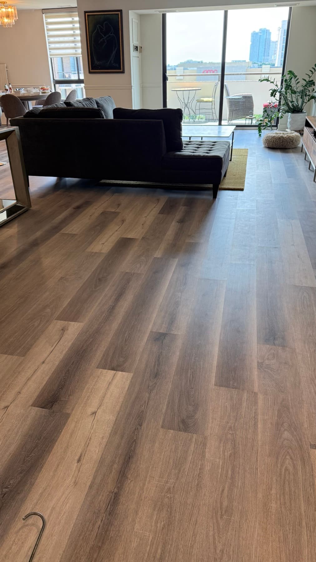 Installed Partek Rhino LVP floor extending through a bright home interior